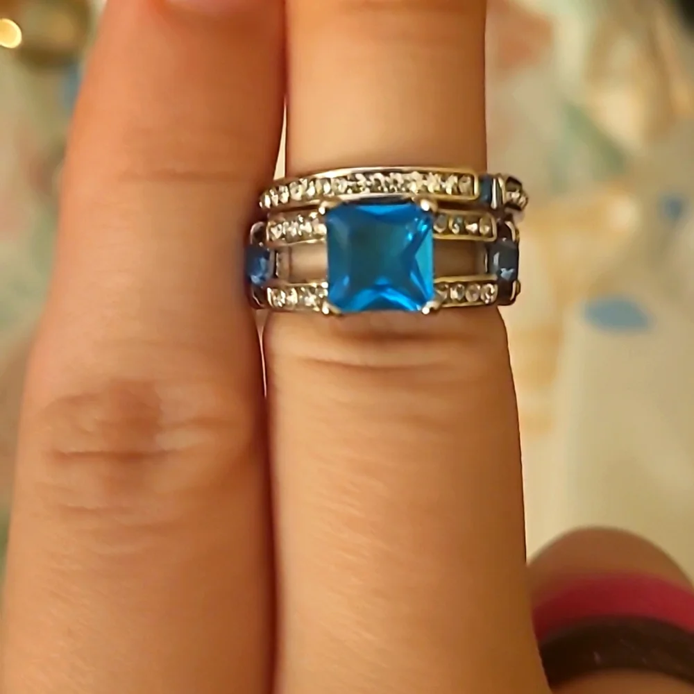 Blue Men And Women Wedding Set. The Women's is a size 7 and Men's is a size 10.